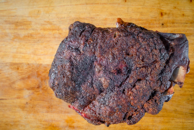 Boston butt pork roast on a wood board — Stittsworth Meats, Bemidji MN