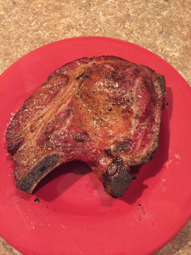 Cooked bone-in pork loin chop — Stittsworth Meats, Bemidji MN